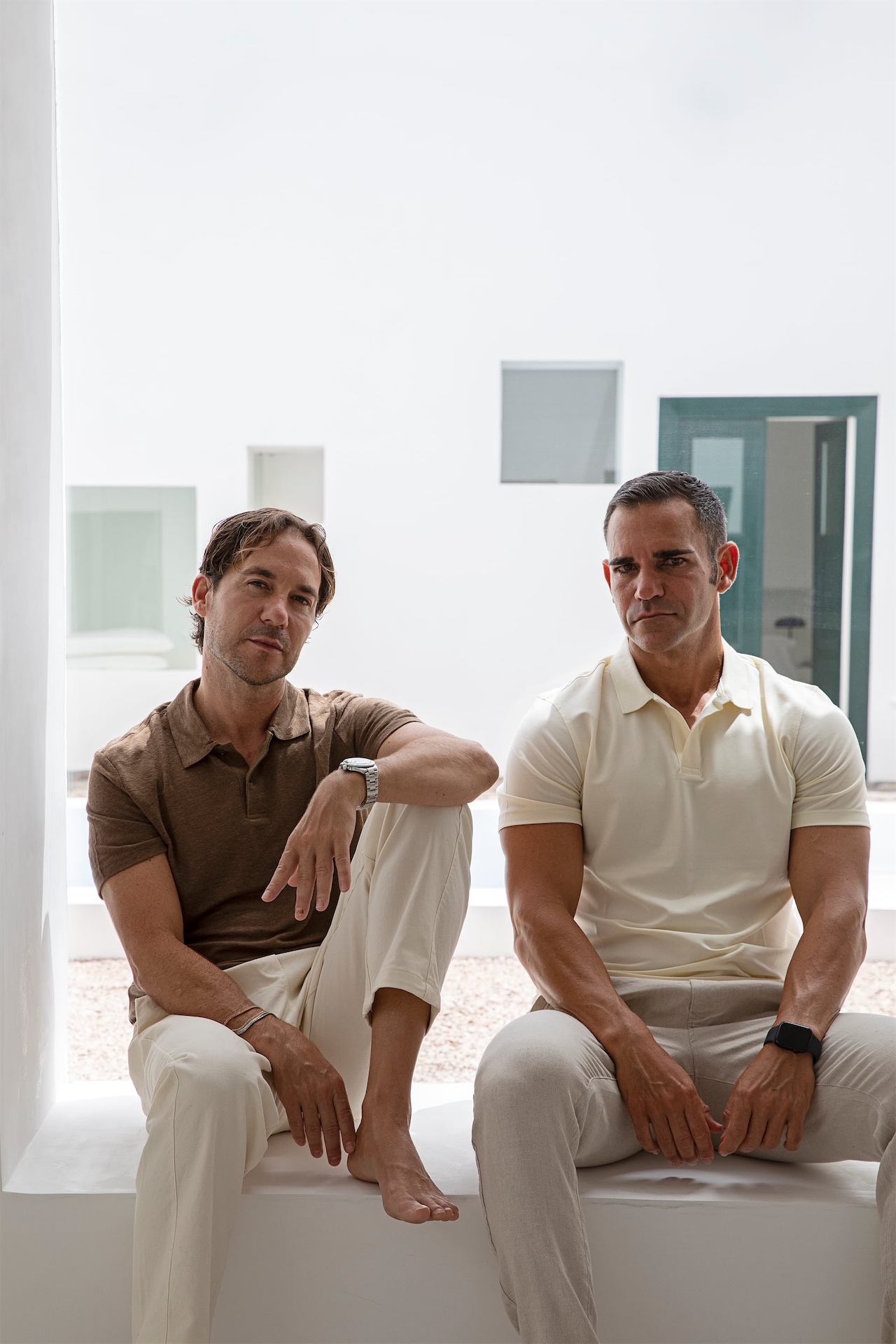 Raúl Ortega Santana and Francisco de Borja Juliá Blanch seated within a bright interior courtyard at Casa Montelongo.
