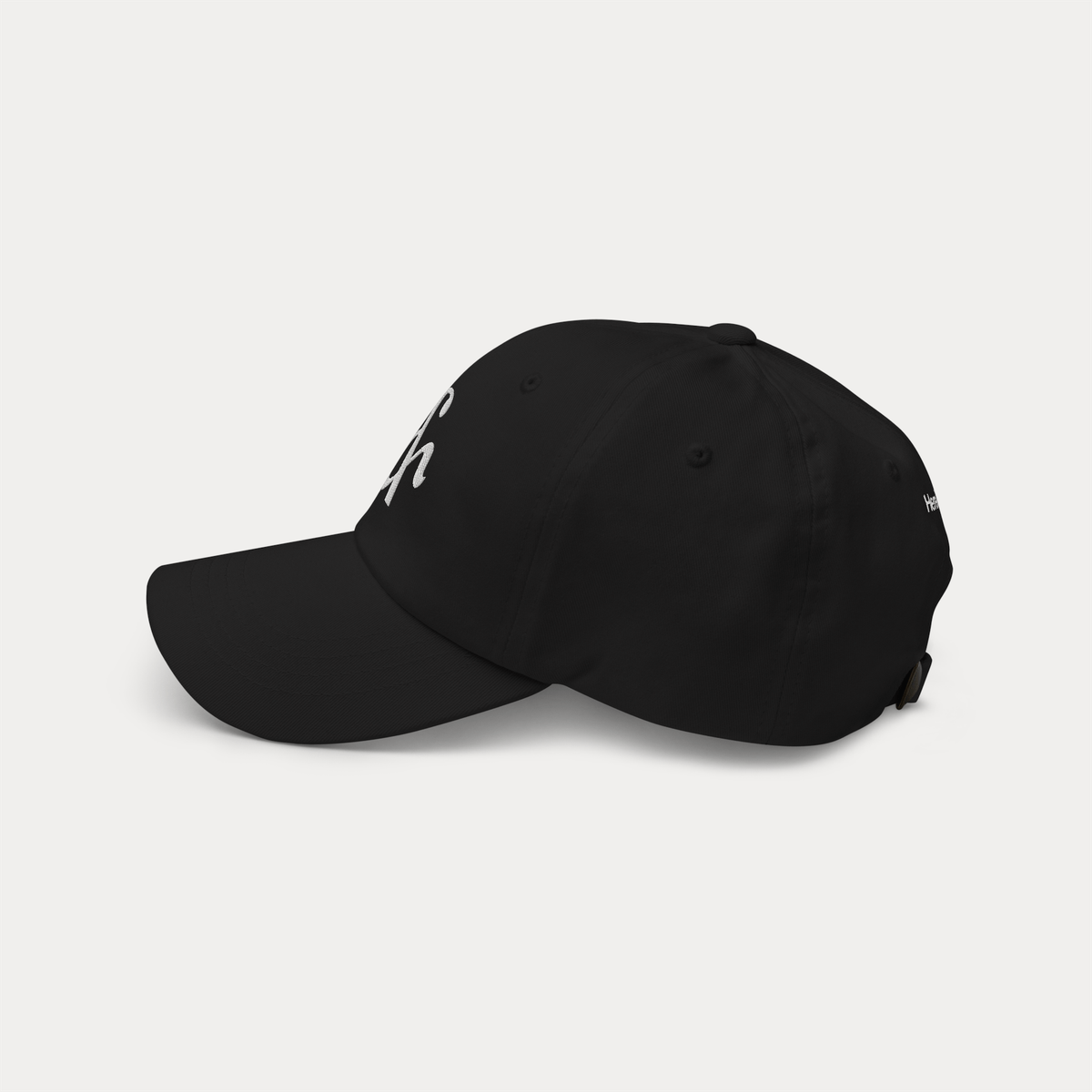 Black dad hat top view showing crown shape and stitching detail
