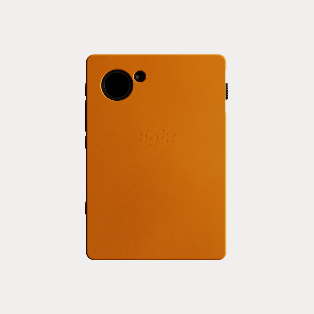 Light Phone III slim case in orange back view with camera cutout