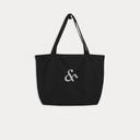 Organic cotton tote bag in black with Here & Away embroidered logo