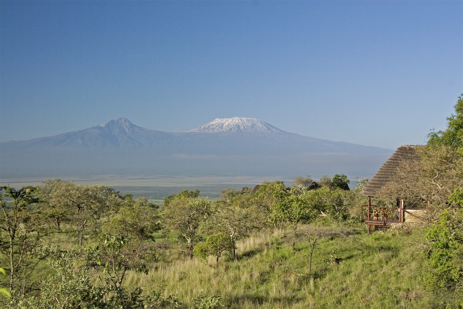 Mount Kilimanjaro rising above the plains as seen from Campi Ya Kanzi in Kenya.