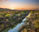 Aerial view of Morukuru Owner’s House set along the river landscape.