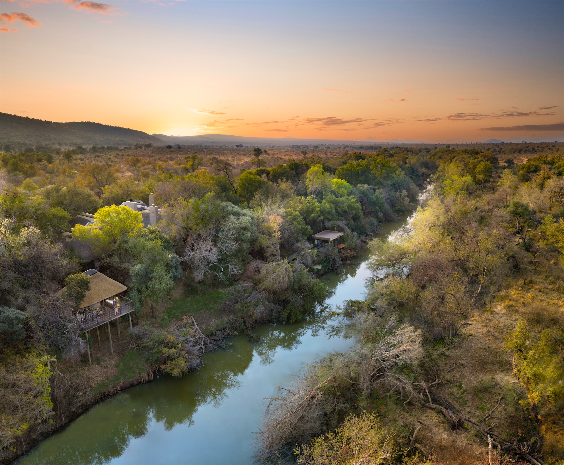 Aerial view of Morukuru Owner’s House set along the river landscape.
