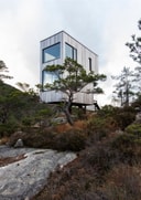 Vipp Bolder cabin elevated on stilts in rugged mountain landscape