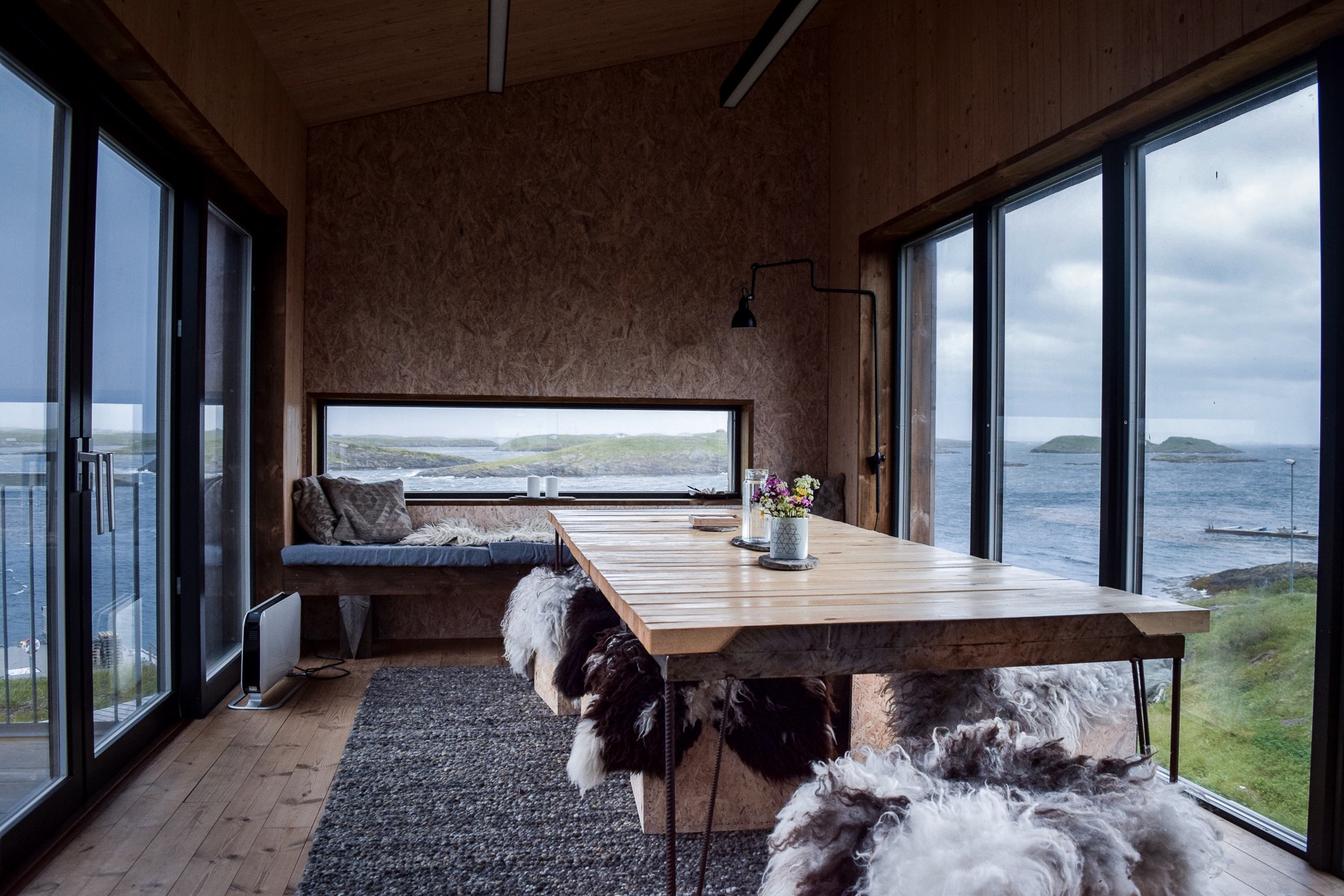 arctic hideaway cabin interior ocean view